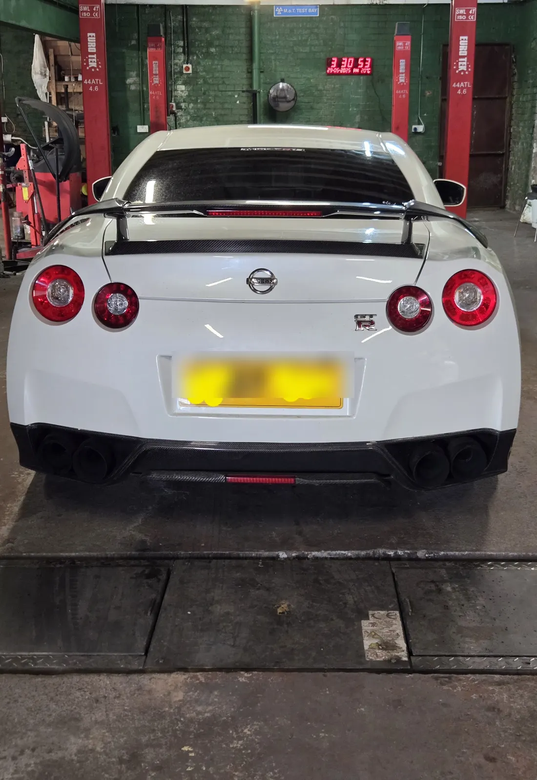 White Nissan GT-R in the bay